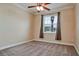 Empty bedroom with neutral colors, carpeted floors, and a view of the outside at 7364 47Th Avenue E Cir, Bradenton, FL 34203