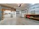 Organized garage area featuring ample shelving, storage, and a workbench at 7364 47Th Avenue E Cir, Bradenton, FL 34203