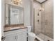 Modern bathroom featuring a glass-enclosed shower, sleek vanity, and contemporary fixtures for a luxurious feel at 8209 Redonda Loop, Lakewood Ranch, FL 34202
