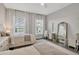 Spacious bedroom features twin beds, a lake view, and a comfortable rug, creating a relaxing atmosphere at 8209 Redonda Loop, Lakewood Ranch, FL 34202