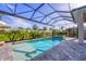 Sparkling pool with spa and screened-in enclosure, perfect for relaxing and entertaining outdoors at 8209 Redonda Loop, Lakewood Ranch, FL 34202