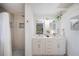 Bright bathroom features a double vanity, modern fixtures, and stylish shower with decorative tile at 8709 9Th Nw Ave, Bradenton, FL 34209