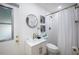 Bathroom featuring tiled shower, vanity with sink and gold finishes at 8709 9Th Nw Ave, Bradenton, FL 34209