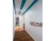 Hallway featuring stylish design elements leading to various rooms in the home at 8709 9Th Nw Ave, Bradenton, FL 34209