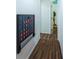 Hallway with a large game of Connect Four hanging on the wall at 8709 9Th Nw Ave, Bradenton, FL 34209
