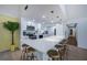 Kitchen featuring a large bar with seating, modern appliances, and bright lighting at 8709 9Th Nw Ave, Bradenton, FL 34209