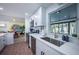 This kitchen features white cabinets, stainless steel appliances, and plenty of counter space at 8709 9Th Nw Ave, Bradenton, FL 34209