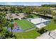 Aerial view of a bocce ball court with a chess board and other community recreation at 8840 Brookfield Ter, Bradenton, FL 34212