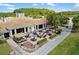 Aerial shot of the clubhouse patio area with outdoor seating and fire pit at 8840 Brookfield Ter, Bradenton, FL 34212