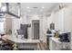 Bright kitchen with granite countertops, stainless steel appliances, and breakfast bar seating at 8840 Brookfield Ter, Bradenton, FL 34212