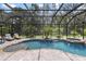 The outdoor pool has a private screened in lanai, brick pavers, and lounging area at 8840 Brookfield Ter, Bradenton, FL 34212
