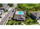 An inviting clubhouse with pool, and landscaping provides amenities for relaxation and recreation at 8979 Milestone Dr, Sarasota, FL 34238