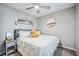 Comfortable bedroom showcases a bed, side table, and wall decorations in a clean and inviting space at 8979 Milestone Dr, Sarasota, FL 34238