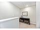 Hallway area features a desk and chair with a nearby access point and an overhead light at 8979 Milestone Dr, Sarasota, FL 34238