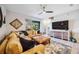 Comfortable living room with stylish decor and a view of outdoor scenery at 8979 Milestone Dr, Sarasota, FL 34238