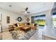 Comfortable living room with stylish decor and a view of outdoor scenery at 8979 Milestone Dr, Sarasota, FL 34238