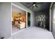 The screened patio provides a comfortable transition to indoor living spaces with views of the living area at 8979 Milestone Dr, Sarasota, FL 34238