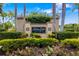 Silver Oak Estates entrance sign surrounded by manicured landscaping and mature trees, creating an inviting atmosphere at 8999 Wildlife Loop, Sarasota, FL 34238