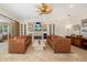 Inviting living room with fireplace, built-ins, and comfortable seating at 8999 Wildlife Loop, Sarasota, FL 34238