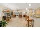 Open-concept living space including kitchen, dining area, and living room at 8999 Wildlife Loop, Sarasota, FL 34238