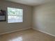 This cozy bedroom has tile floors and a bright window at 900 La Costa Cir # 4, Sarasota, FL 34237