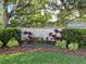Landscaped community sign reading 'Park View on Costa Circle', set against lush trees and greenery at 900 La Costa Cir # 4, Sarasota, FL 34237