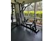The building includes a gym filled with equipment in front of a bright window at 900 La Costa Cir # 4, Sarasota, FL 34237