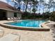 This community pool has lounge chairs and a relaxing atmosphere at 900 La Costa Cir # 4, Sarasota, FL 34237