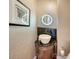 Powder room features stylish bowl sink and designer lighting at 990 Blvd Of The Arts # 801, Sarasota, FL 34236