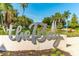 Signage reading 'the Bay' surrounded by lush landscaping and a fountain, offering a welcoming entrance at 990 Blvd Of The Arts # 801, Sarasota, FL 34236