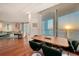 Open floor plan features the dining area with seamless connection to the living area and water views at 990 Blvd Of The Arts # 801, Sarasota, FL 34236