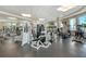 Well-equipped gym featuring modern exercise equipment, including treadmills, weight machines, and free weights at 990 Blvd Of The Arts # 801, Sarasota, FL 34236