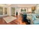 Open floor plan with hardwood floors and comfortable living space for relaxing and entertaining at 990 Blvd Of The Arts # 801, Sarasota, FL 34236