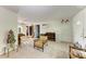 Spacious living room with tile flooring and vintage furniture at 10095 Nassau Ct, Seminole, FL 33776