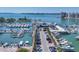 High-angle view capturing marina and waterfront amenities under clear blue skies at 101 S Gulfstream Ave # 15C, Sarasota, FL 34236