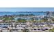 High-angle view showcasing the waterfront location with a marina and city skyline backdrop at 101 S Gulfstream Ave # 15C, Sarasota, FL 34236