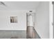 Bright, open living space with neutral walls and dark tile flooring, ready for personalization at 101 S Gulfstream Ave # 15C, Sarasota, FL 34236