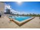 Outdoor pool with sundeck and views of the bay at 101 S Gulfstream Ave # 15C, Sarasota, FL 34236