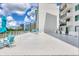 Rooftop sundeck with seating and views of the bay and city at 101 S Gulfstream Ave # 15C, Sarasota, FL 34236