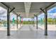 Rooftop terrace with shaded seating areas and views of the surrounding area at 101 S Gulfstream Ave # 15C, Sarasota, FL 34236
