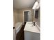 Bright bathroom featuring tiled walls, modern fixtures, and sleek quartz countertop at 1132 26Th S Ave, St Petersburg, FL 33705