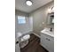 A modern bathroom with a bathtub, white cabinets, and a sleek vanity with a faucet at 1132 26Th S Ave, St Petersburg, FL 33705