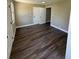 A well lit bedroom with vinyl flooring at 1132 26Th S Ave, St Petersburg, FL 33705