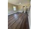 A bright bedroom features wood floors and large windows that let in ample natural light at 1132 26Th S Ave, St Petersburg, FL 33705