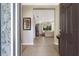 Open-concept foyer that leads to a spacious living room, showcasing the home's layout and inviting atmosphere at 11610 Griffith Park Ter, Bradenton, FL 34211