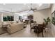 Open living and dining areas featuring a full view of the kitchen, providing seamless integration for entertaining at 11610 Griffith Park Ter, Bradenton, FL 34211