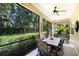 Screened-in patio, with views of the green landscaping at 11610 Griffith Park Ter, Bradenton, FL 34211