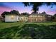Backyard with a screened-in pool and patio area, great for outdoor relaxation and entertaining at 13640 2Nd E Ave, Bradenton, FL 34212