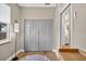 Bedroom featuring a closet, window, and hardwood floors at 13640 2Nd E Ave, Bradenton, FL 34212
