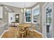 Cozy breakfast nook with a round table and large windows at 13640 2Nd E Ave, Bradenton, FL 34212